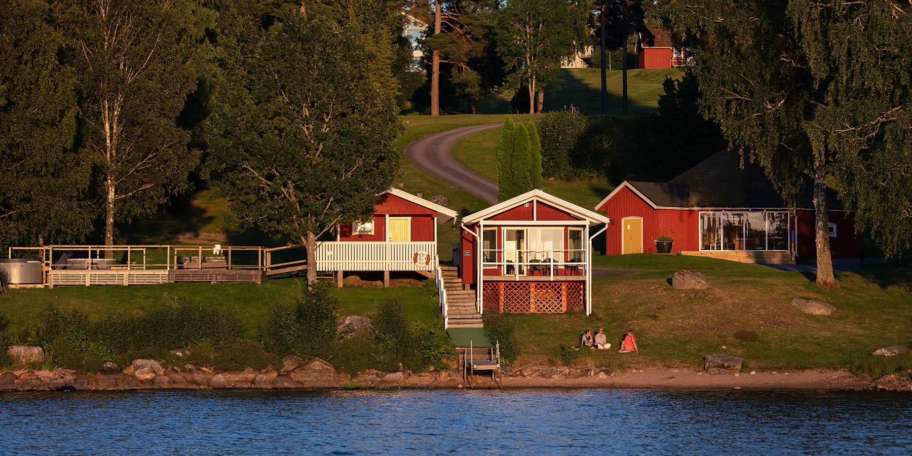 Two shuttles by the water